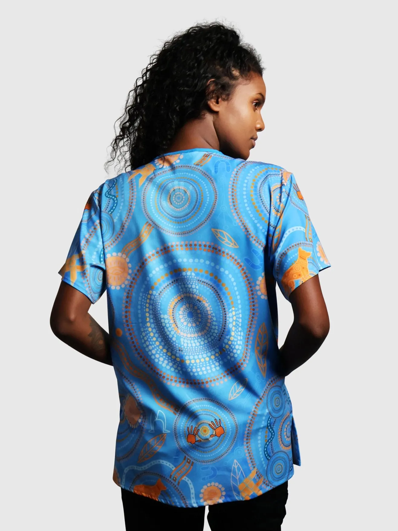 Never Stop the Dreaming - NAIDOC 2025 Unisex Three-Pocket Scrub Top